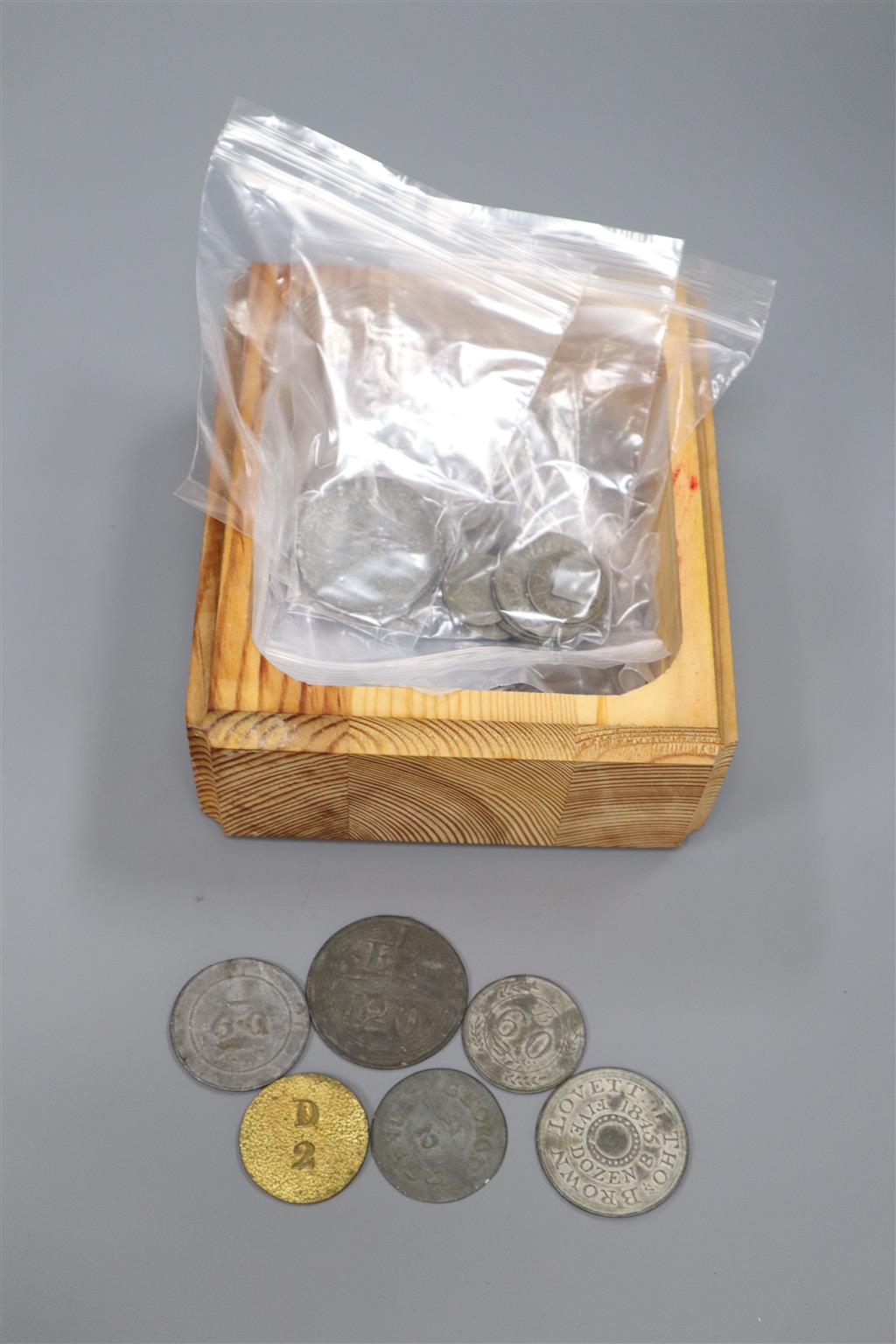A large collection of 19th century Sussex and Kent hop tokens, approximately 128